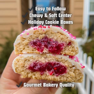 May include: Two halves of a gourmet cookie with a red fruit filling, white icing, and pink and red sprinkles. The text on the image says "Easy to Follow", "Chewy & Soft Center", "Holiday Cookie Boxes", and "Gourmet Bakery Quality".
