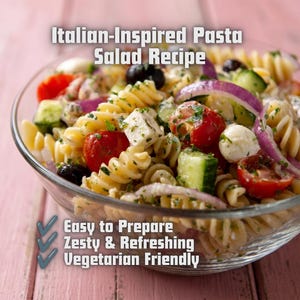May include: A glass bowl filled with pasta salad containing rotini, cherry tomatoes, cucumber chunks, red onion slices, black olives, and white cheese cubes. Text reads: Italian-Inspired Pasta Salad Recipe, Easy to Prepare, Zesty & Refreshing, Vegetarian Friendly.