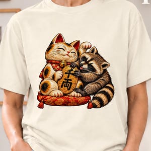 Raccoon Trying to Steal a Lucky Cat Coin T-Shirt, Comfort Colors 1717