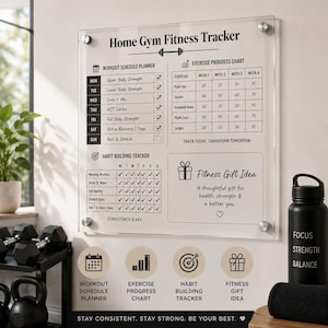May include: A clear acrylic wall-mounted home gym fitness tracker board with black printed text and grids. It features sections for a workout schedule, exercise progress chart, habit building tracker, and a fitness gift idea section.