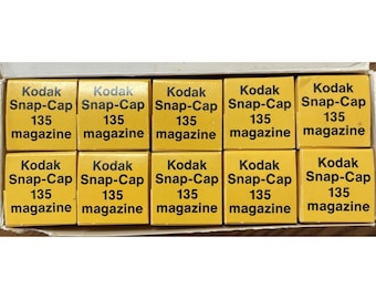 Lote de 10 cargadores Kodak Snap-Cap 135 antiguos, sellados.