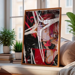 Può includere: Una stampa artistica incorniciata con un design astratto con elementi rossi, neri e bianchi. L'opera d'arte presenta un ritratto di una persona con i capelli rossi. È esposta su un davanzale con piante e libri.