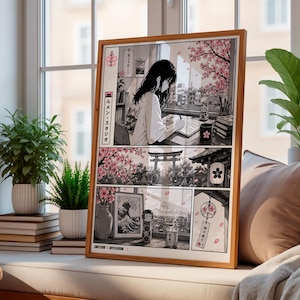 May include: A framed manga-style art print featuring a person writing at a desk, a torii gate, cherry blossoms, and a kokeshi doll. The artwork includes Japanese text, a depiction of a wave painting, and a hanging wind chime, all rendered in a black, white, and soft pink color palette.