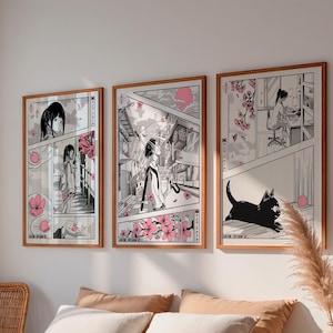 May include: Three framed art prints featuring manga-style illustrations. Each print has a wooden frame and depicts scenes with figures, cherry blossoms, and Japanese text. The artwork is primarily black, white, and pink.