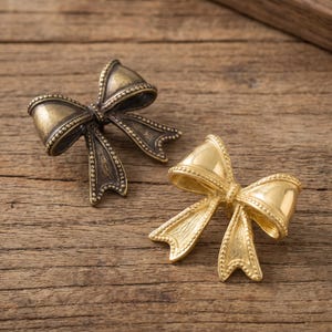 Pomello per armadio a forma di fiocco, maniglia per cassetto a nastro, maniglia vintage per comò, ferramenta decorativa per mobili, grazioso pomello per armadietto da cucina, accessorio per anta del bagno