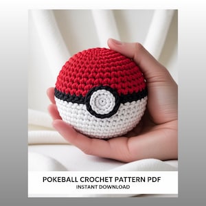 May include: A crocheted Pokeball in red, white, and black, held in a hand. The top half is red, the bottom half is white, and a black band with a white circle detail divides the two. Text at the bottom reads "POKEBALL CROCHET PATTERN PDF INSTANT DOWNLOAD."