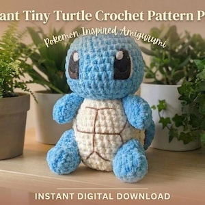 May include: A crocheted blue turtle amigurumi with a cream-colored shell, inspired by a popular character. The image includes text that reads "Giant Tiny Turtle Crochet Pattern PDF" and "Pokemon Inspired Amigurumi".