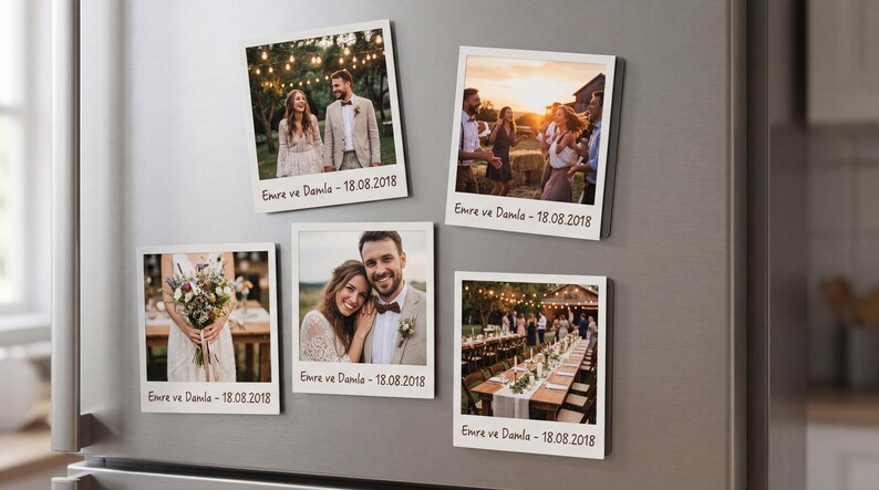 May include: Five square magnets displaying wedding photographs, attached to a stainless steel fridge. Each magnet features a different image from a wedding, with the text "Emre ve Damla - 18.08.2018" printed on each.