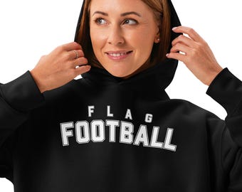 Sudadera con capucha holgada para mujer con estampado de flag football.