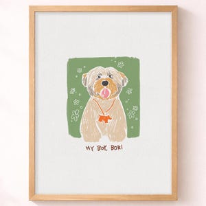 May include: A framed art print featuring a tan dog with a pink tongue, wearing an orange collar with a dog-shaped charm. The dog is set against a green background with white flower outlines. The text MY BOY, BORI is printed below the illustration.
