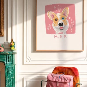 May include: A framed wall art print featuring a stylised illustration of a Corgi dog with one blue eye and one brown eye, set against a pink square background with star accents and the name Rex written in pink text below the dog illustration.