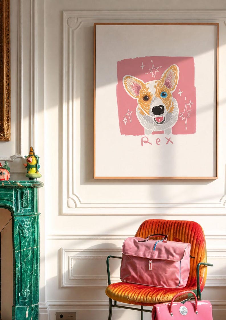 May include: A framed wall art print featuring a stylised illustration of a Corgi dog with one blue eye and one brown eye, set against a pink square background with star accents and the name Rex written in pink text below the dog illustration.