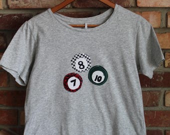 Camiseta de retazos con diseño de bola de billar