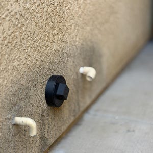 Hide-a-Key / Plumbing Cleanout