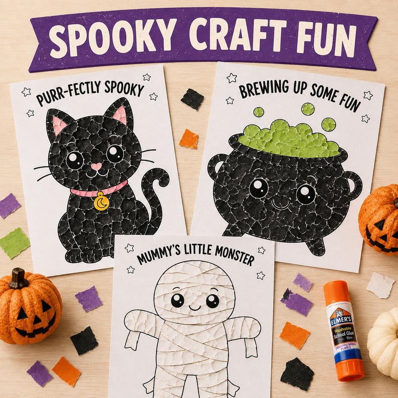 May include: Three Halloween craft activity sheets titled Spooky Craft Fun featuring a black cat with a pink collar, a bubbling green cauldron, and a mummy. Each character is filled with torn paper pieces. Includes a glue stick and small pumpkins.
