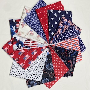 May include: A collection of folded fabric squares in red, white, and blue, featuring star and flag patterns. The arrangement is circular, showcasing various patriotic designs. Ideal for crafting or decorative projects.