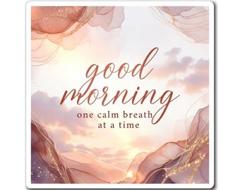 Imán con texto "Buenos días" y frase relajante sobre el amanecer