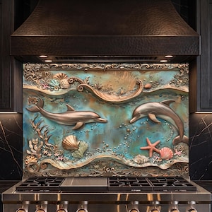 May include: A rectangular metal backsplash panel featuring a relief sculpture of two dolphins swimming in a turquoise and bronze ocean scene. The design includes detailed seashells, starfish, coral, and swirling wave patterns in a metallic finish.