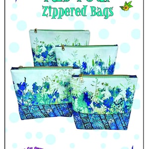 May include: Four zippered bags with a floral design in shades of blue and green on a white background. The bags have a decorative blue border and gold zips. The text "The Fab Four Zippered Bags" is at the top.