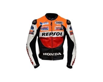 May include: A motorcycle racing jacket in black, white, and orange, featuring the Honda and Repsol logos. The jacket has a zippered front, padded shoulders, and various sponsor logos. The sleeves are black and white, with additional branding.