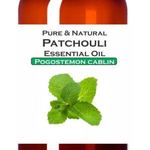 May include: A brown glass bottle with a black cap, labeled "Pure & Natural Patchouli Essential Oil". A green sprig of mint is featured below the text. The bottle is filled with a dark amber liquid.