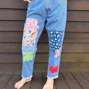 Patchwork jeans! Gap jeans upcycled with patches of flower fabrics to create a unique item.