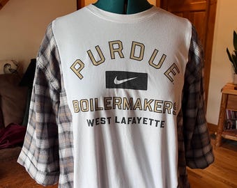 Purdue Boilermaker tshirt upcycled with a flannel shirt and drawstring to create a unique school spirit item.