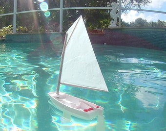 Miniature Optimist Sailing Dinghy