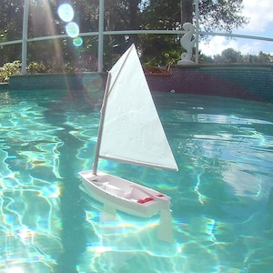 Miniature Optimist Sailing Dinghy