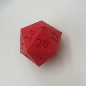 May include: A red twenty-sided die with numbers 6, 14, 20, and 11 visible.