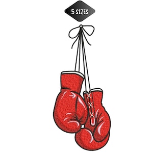 May include: A pair of red boxing gloves hanging from black strings, tied with a bow. The gloves have white trim and white laces. A black diamond-shaped graphic above reads "5 SIZES".
