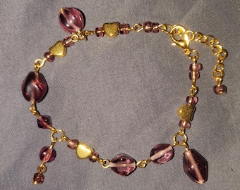 Pulsera con dije de cristal morado dulce