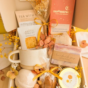 Gift Box For Her Birthday Care Package Thoughtful Present Collection Special Birthday Gift Unique Celebration Box Personalized Birthday Message Cozy Comfort Items Handcrafted Gift Set Complete Surprise Package Self Care Products Beautiful