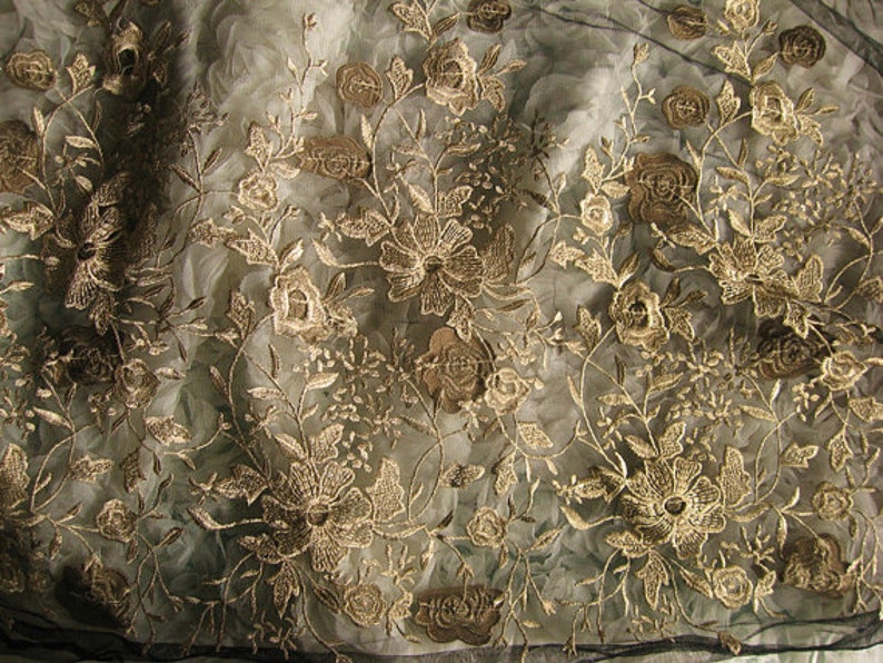 black lace fabric with gold embroidery