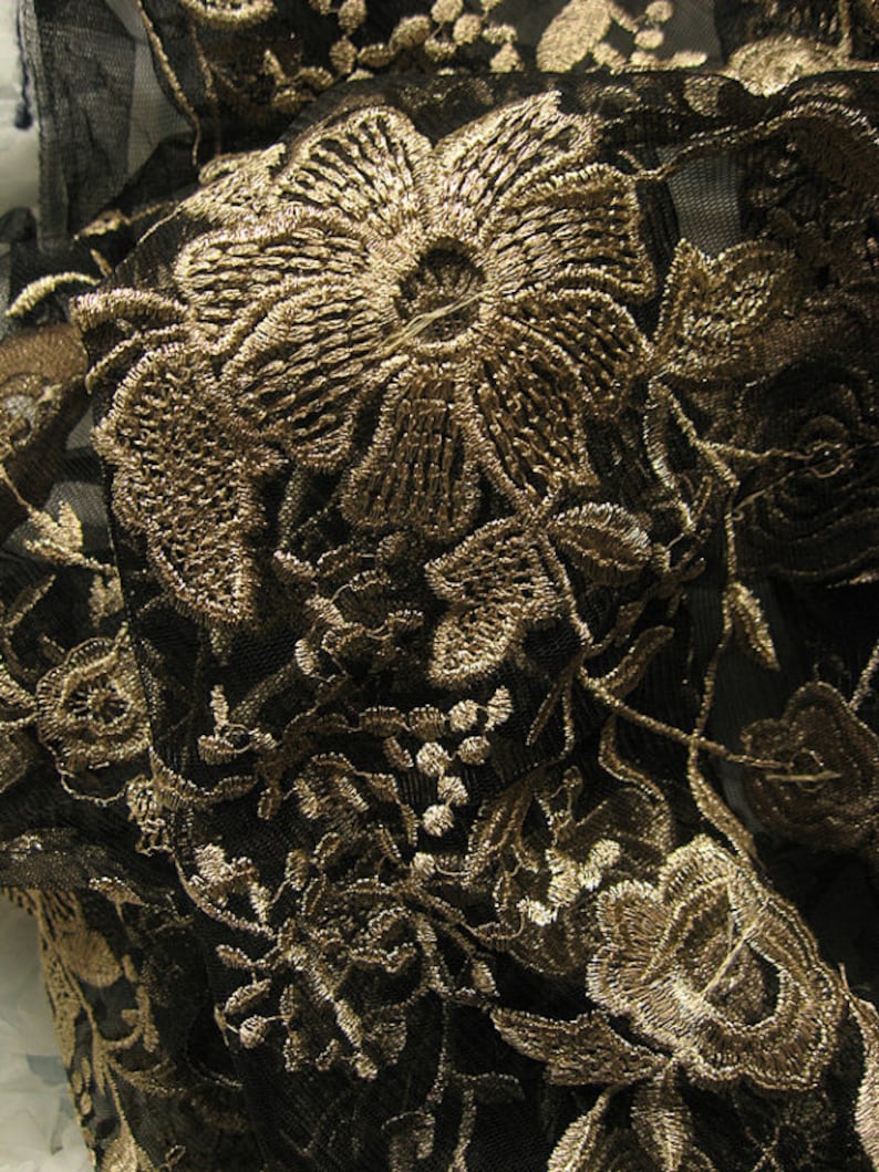 black lace fabric with gold embroidery