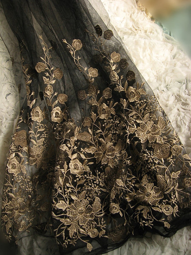 black lace fabric with gold embroidery