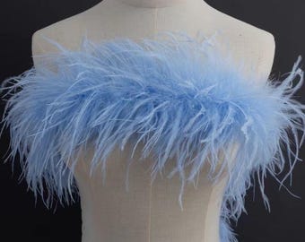 Boa de plumas de avestruz azul claro para vestidos y alta costura.