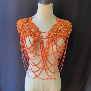 Orange rhinestone cape with chains for costume, body jewelry with fringe, shoulder necklace for couture and dance costume