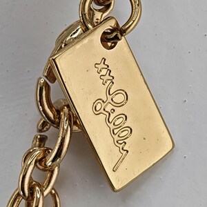 May include: A set of three ceramic mugs with a speckled, matte finish. The mugs are in shades of cream, light brown, and dark brown. Each mug has a simple, minimalist design, perfect for coffee or tea.