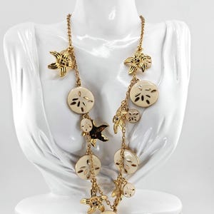 May include: A set of three ceramic mugs with a speckled, matte finish. The mugs are in shades of cream, light gray, and dark gray. Each mug has a simple, minimalist design, perfect for coffee or tea.