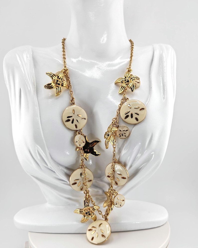 May include: A set of three ceramic mugs with a speckled, matte finish. The mugs are in shades of cream, light gray, and dark gray. Each mug has a simple, minimalist design, perfect for coffee or tea.