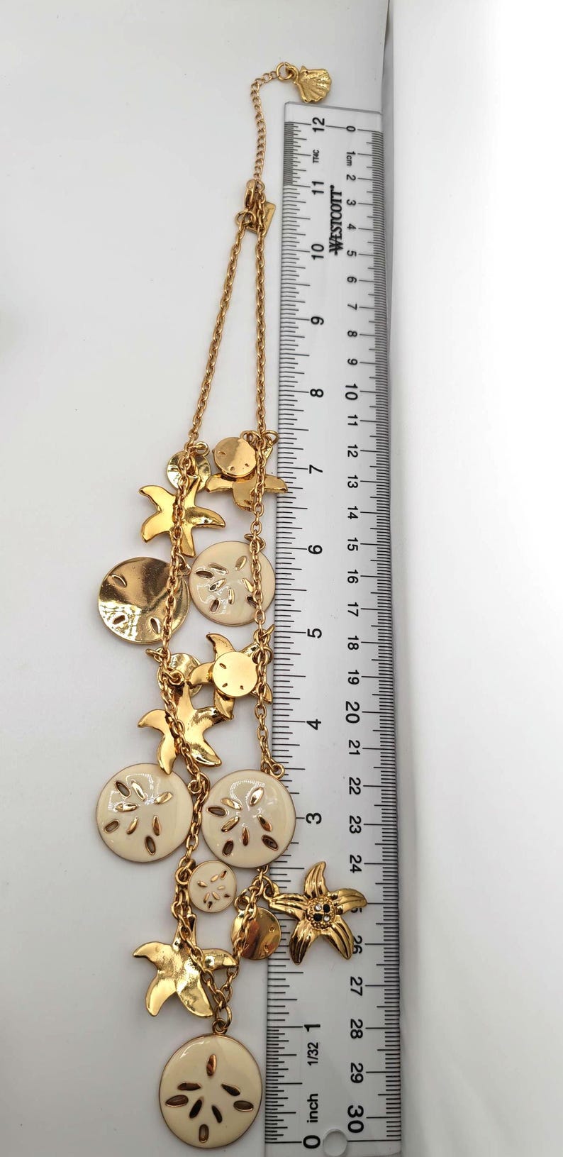 May include: A set of three ceramic mugs with a speckled, matte finish. The mugs are in shades of cream, light gray, and dark gray. Each mug has a simple, minimalist design and a rounded handle. Perfect for coffee or tea.