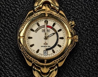1997 Seiko Kinetic Sports 100 Ladies Watch – 3M22-0B69 – Gold Tone – 32mm