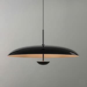 May include: A contemporary black pendant light. It features a large, curved, black shade with a warm, light-coloured underside. A smaller, bowl-shaped element hangs below the main shade. The light hangs from a single cable.