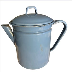 May include: A vintage light blue enamelware coffee pot with a lid and handle. The spout is on the left side, and the handle is on the right. The pot has a classic design and is likely from the mid-20th century.