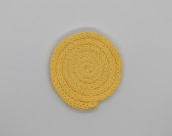 Dessous de verre jaune vif tricotés à la main