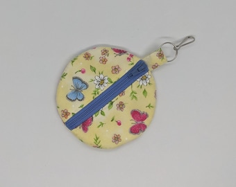 Pochette pour écouteurs jaune florale avec papillons