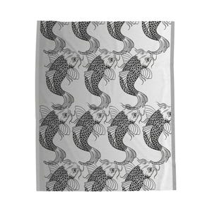 May include: A white blanket featuring a repeating pattern of black and white koi fish. The koi fish are stylized with detailed scales and flowing fins, creating a visually appealing design. The blanket has a soft, inviting appearance.
