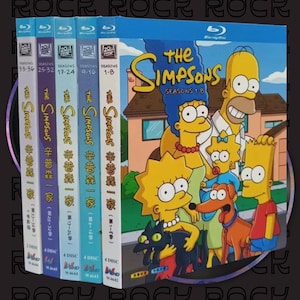 May include: A collection of Blu-ray discs featuring the animated series "The Simpsons." The box set includes seasons 1-36, with colorful artwork of the Simpson family. The discs are in a row, with Japanese text.