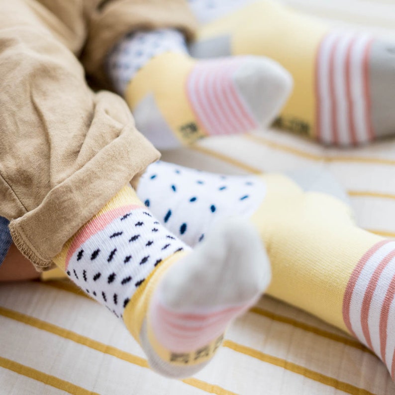 baby socks freckles yellow